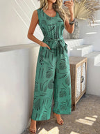 Devine Printed Round Neck Sleeveless Tie Waist Jumpsuit | One-Pieces Jumpsuit from PHUNKYN