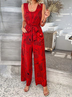 Devine Printed Round Neck Sleeveless Tie Waist Jumpsuit | One-Pieces Jumpsuit from PHUNKYN