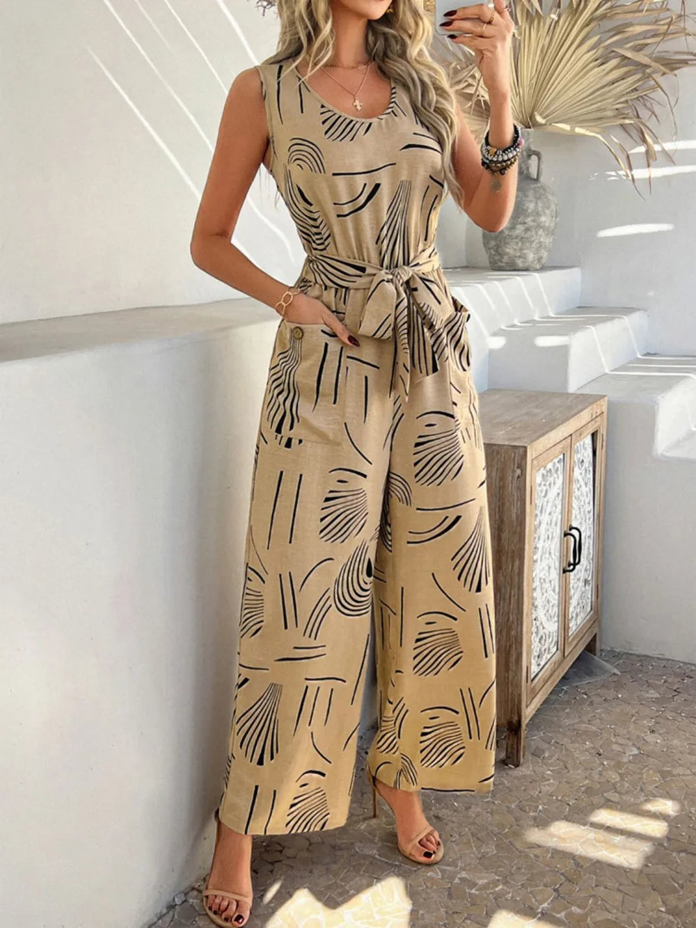 Devine Printed Round Neck Sleeveless Tie Waist Jumpsuit | One-Pieces Jumpsuit from PHUNKYN